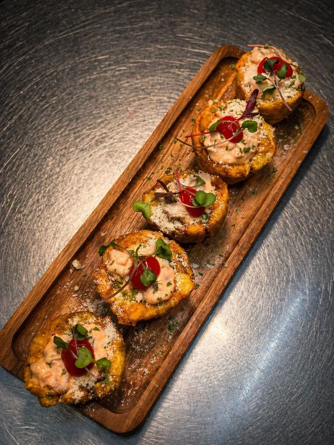 Crispy Caribbean tostones (fried green plantains) at Sensaciones